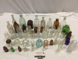 Lg. lot of antique glass bottles; blue, green, clear, brown, some branded, Royal Purple, Kickapoo