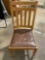 Vintage wood chair w/ leather seat, shows wear, approx 17 x 17 x 37 in.