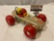 Vintage Fisher Price wood / plastic race car toy, shows wear, approx 7 x 10 x 4 in.