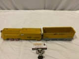 Antique metal Marx Toys toy train w/ engine and open load car, approx 19 x 3 x 3 in.