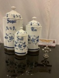 3 pc. vintage porcelain kitchen jars w/ lids; salt, tea, sugar, approx 5 x 11 in. Sold as is.