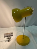 Vintage yellow metal desk lamp, tested/working, approx 7 x 14 in.