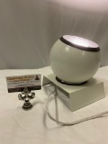 Vintage ball lamp w/ stand, tested/working, approx 8 x 8 in.