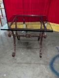 Antique solid iron and heavy, outdoor, indoor table with glass top