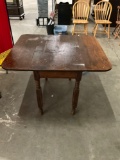 Gorgeous antique table with turned legs and original hardware, just needs to be refinished
