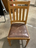 Vintage wood chair w/ leather seat, shows wear, approx 17 x 17 x 37 in.