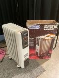 DeLonghi Oil filled electric radiator, tested and working, approx 16 x 25 x 7 in.