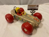 Vintage Fisher Price wood / plastic race car toy, shows wear, approx 7 x 10 x 4 in.