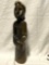 Mutli colored and textured Hand Carved African Stone Sculpture of person listening Signed by Artist
