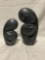 Pair of different sized Hand Carved African Stone sculptures of resting lovers signed by same artist