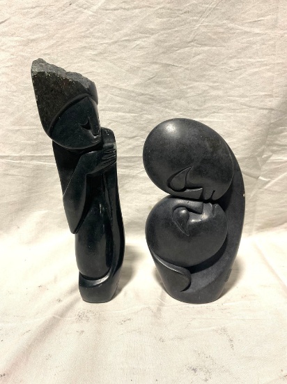Pair of Hand Carved African Stone sculptures of a woman resting and lovers , Signed by the Artist