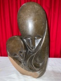 Large African stone sculpture of woman and child , See pics this piece has potential