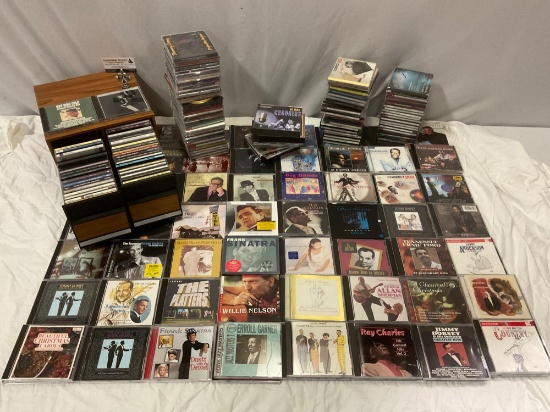 Huge collection of Compact Discs / CDs; Crooners, Vocalists, & more. Includes 2-drawer disc storage