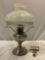 Antique steel oil lamp with glass shade , approx 11 x 19 in.