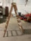 Approximately 6 foot wooden ladder by design air , Good shape
