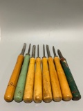 Lot of 8 vintage wood-handle chisels. Two marked Buck Bros