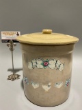 Smaller crock with lid in good condition. Lovely painted designs. Measures 8 x 8 inches