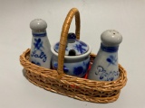 Cute little German salt and pepper shakers with matching sugar jar with lid. Comes with wicker