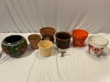 8 pc. Lot of flower pots, flower bowl, Santa Claus, & more.