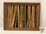 Framed natural bamboo / reed art piece, approximately 27 x 21.5 in.