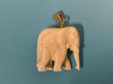 Antique bone carved elephant pendant, approx 1 x 1 in.
