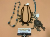 3 pc. lot of vintage necklaces; glass / metal beaded, African wood / brass, Afghan pendant. 14 in.