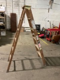 Approximately 6 foot wooden ladder by design air , Good shape