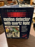 Intelectron New and unused motion detector w/ quartz light Model BC873K