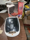 Used maybe once in open box George foreman a lean mean grilling machine