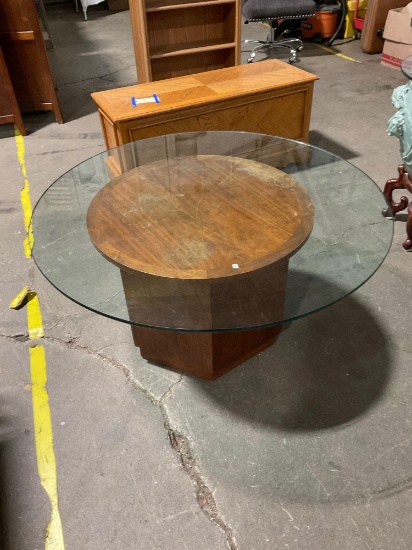 Wooden octagon glass top coffee table see pics/21 inches high/glass top is 42 inches in diameter