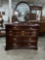 Vintage cherry wood? Bedroom dresser with nine dovetailed drawers and oval swivel mirror