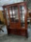 Sleek Modern lighted ,mirrored back curio display hutch with removable glass shelves