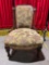 Very nice antique embroidered children?s chair on casters.
