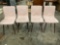 Set up for mid century modern style metal framed chairs with mauve coverings
