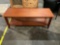 Very nice solid would two tiered coffee table with very sleek lines