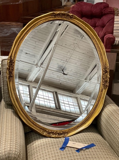 Antiqued Gold painted Oval wooden frame with beveled mirror by Uttermost