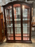 Very nice larger solid wood display mirrored back lighted cabinet, W/3 glass shelves and sides