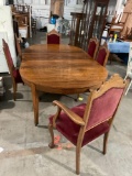 Circa 1830s antique tiger oak dining table on metal casters w/ 6 matching chairs lions feet