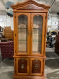 Gorgeous solid wood curio display cabinet w/ beveled glass doors , 2 glass shelves by Hamilton.