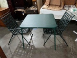 Green foldable card/camping table W/2 forest green metal foldable chairs W/vinyl seating
