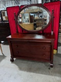 Stunning late 1800s Berkey and Gay American empire Mahogany dresser with large oval swivel mirror