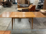 Beautiful mid century table with fold under extendable leaves pretty inlaid wood grain