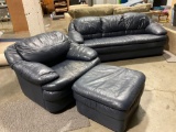 Dark blue leather sofa, matching easy chair with the Ottoman. Made in Italy