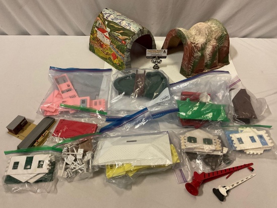 Collection of vintage train set diorama plastic buildings, printed tin tunnel, and more.