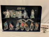 vintage 1992 Star Trek 12 figure set w/ blue plastic Enterprise display shelf, figure are sealed.