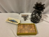 3 pc. lot of TOMMY BAHAMA ceramic ashtray, bamboo dominoes set & pineapple tea candle lanter, approx