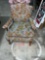 Smaller vintage living room chair with floral pattern