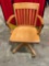 Vintage solid oak adjustable rolling , swivel office chair