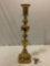 Large vintage metal Brass tone pedestal candleholder, approx 8 x 8 x 31 in.