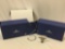 2 pc. Lot of SWAROVSKI Christmas Ornament display stands w/ boxes, approx 8 x 13 x 5 in.